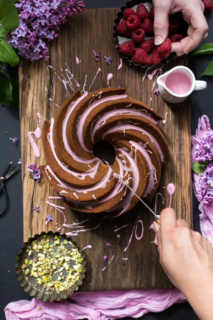 Lemon Bundt Cake with Pink Icing and pistachio nuts | via @annabanana.co
