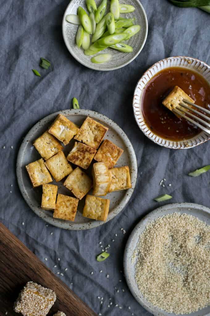 Sticky tofu in sesame seeds, served with soba noodles and zucchini | via @annabanana.co