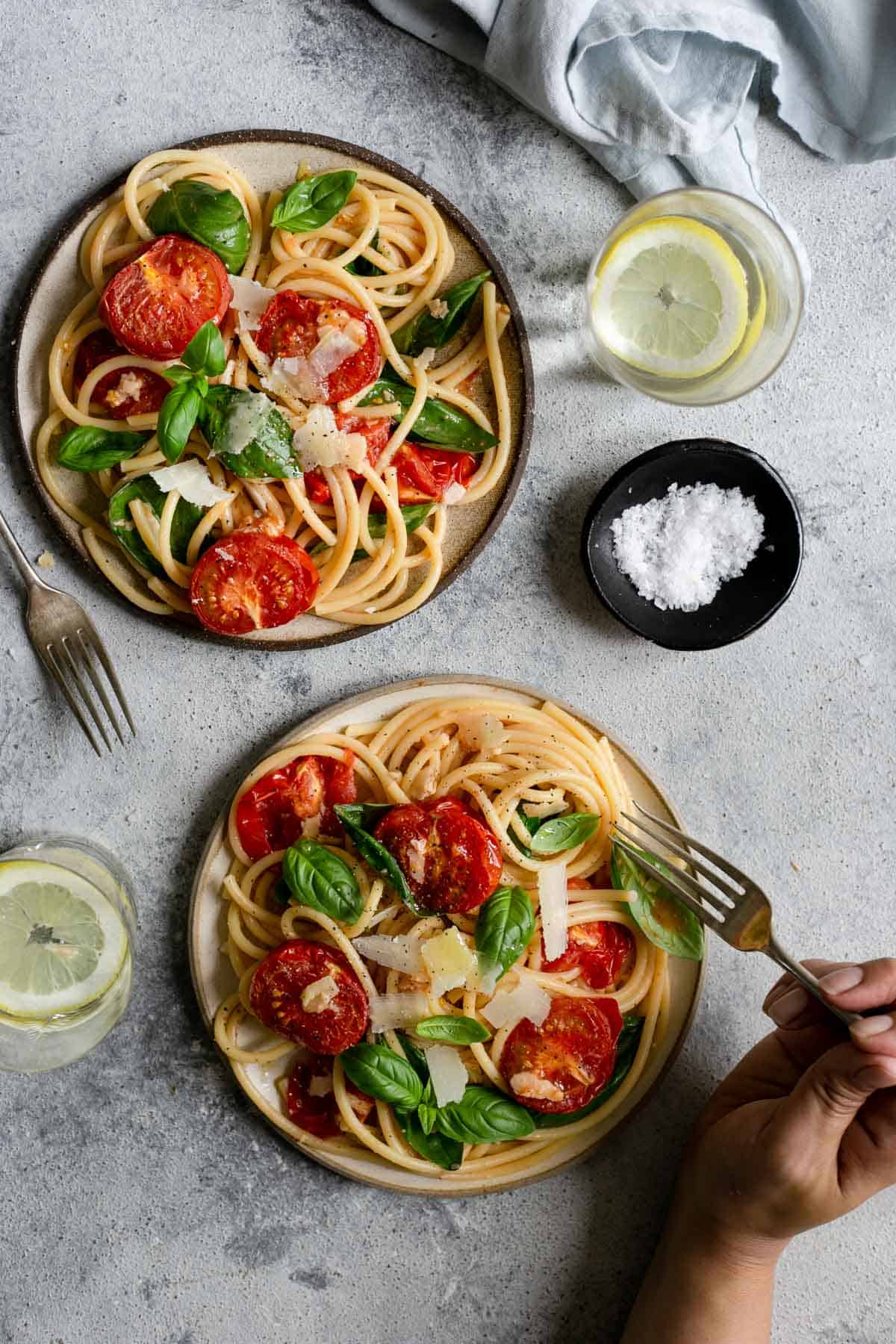 Simple and effortless recipe for wonderful bucatini pasta with roasted tomatoes and fresh basil #easyrecipes #simplerecipe #pasta