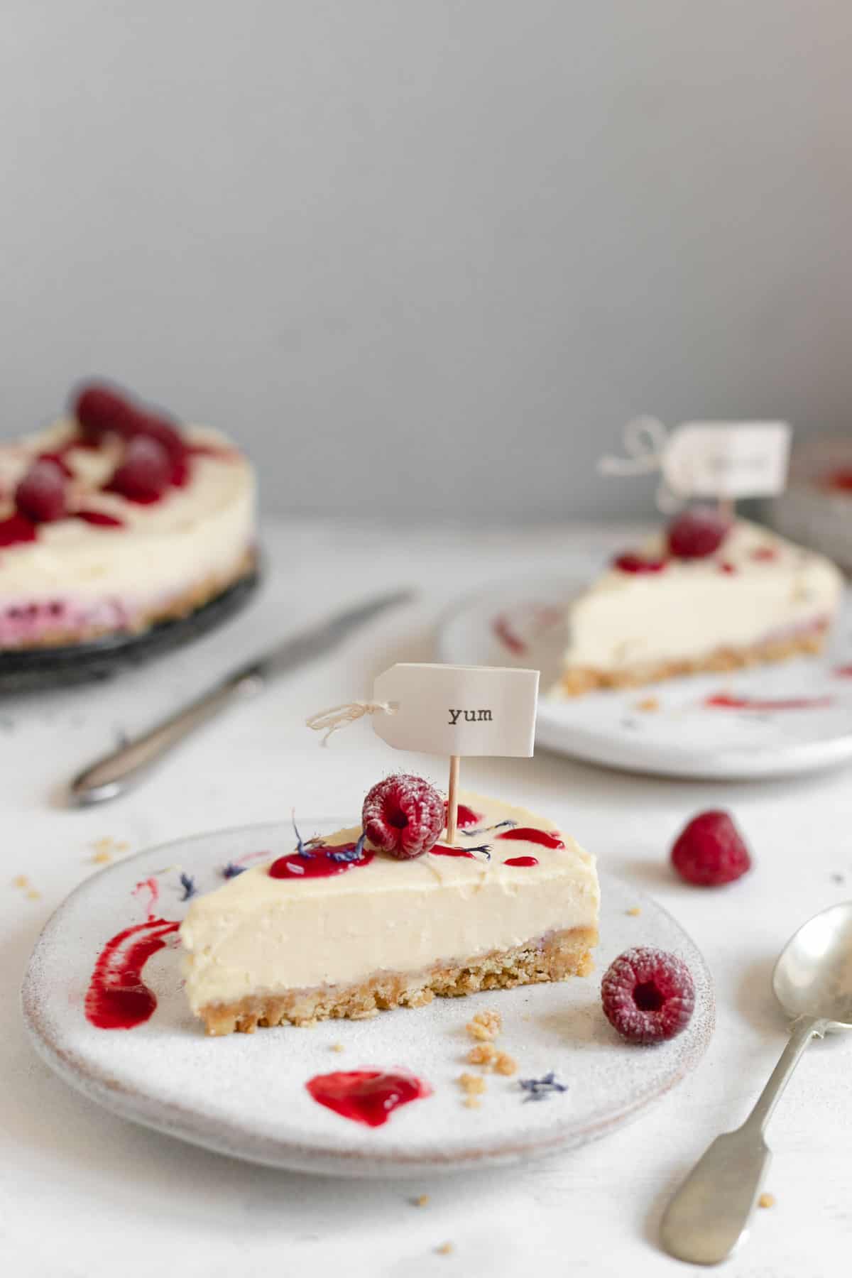 Slice of creamy and delicious raspberry and white chocolate cheesecake #cheesecakerecipe #cheesecake #nobakedessert | via @annabanana.co