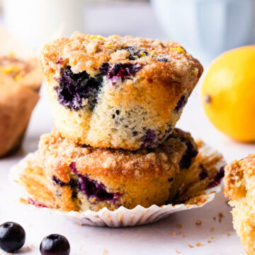a stack of two blueberry lemon muffins