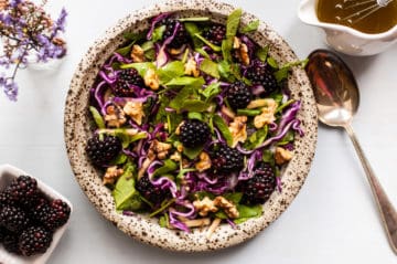 Blackberry and caraway slaw! Perfect seasonal salad recipe with red cabbage, blackberries and caraway seeds, served with mustard dressing. Great combination of flavors and really easy to prepare via@ annabanana.co
