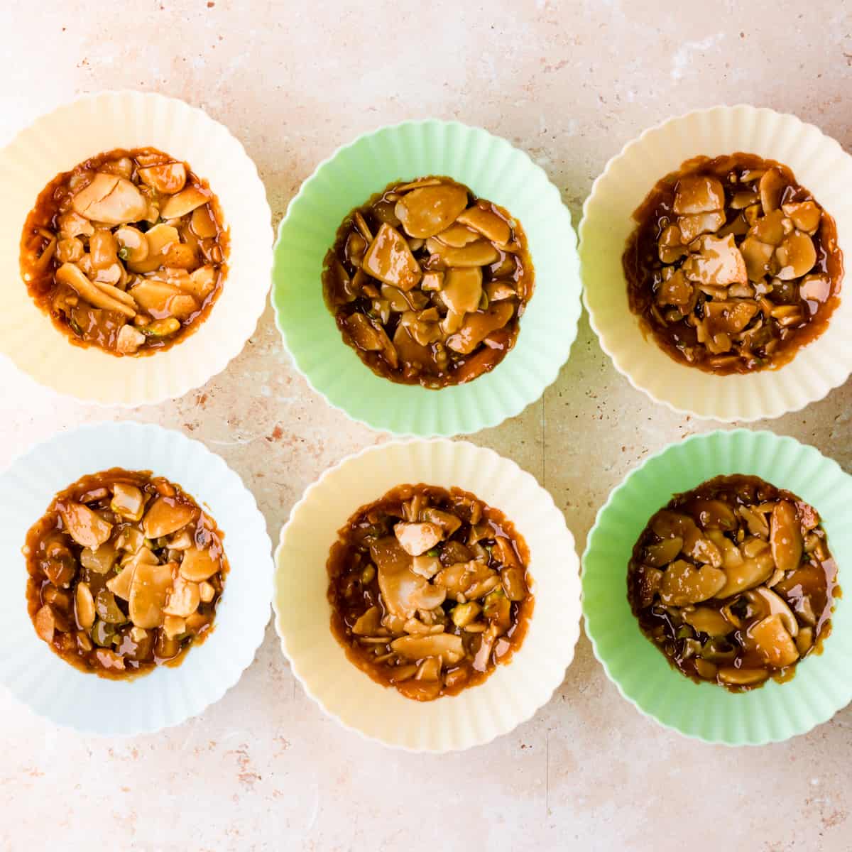almond florentines baked inside of the silicone cupcake cases.