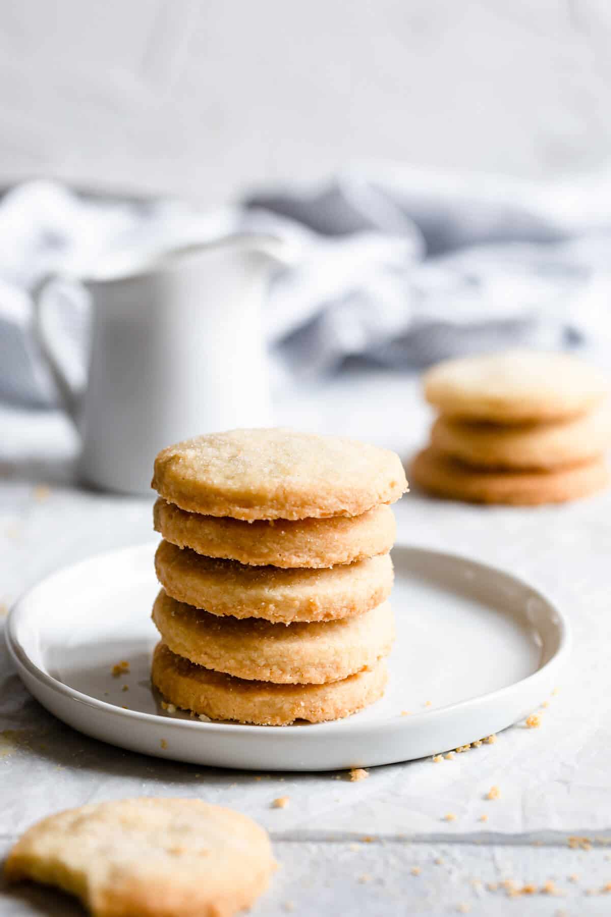 side view of a stack of cookies on a white plate