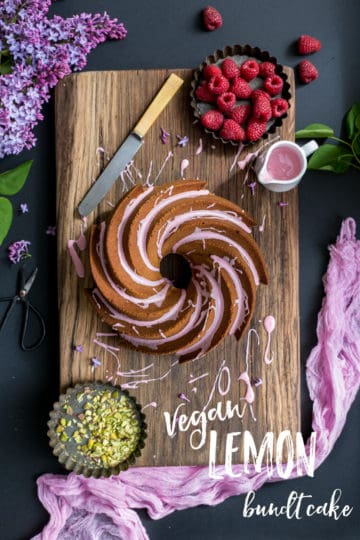Vegan Lemon bundt cake with pink icing and crushed pistachio nuts | via @annabanana.co