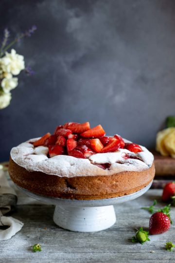 Light and moist fresh strawberry cake with icing sugar