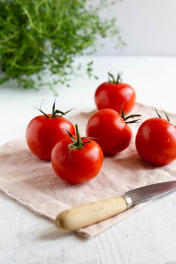 Fresh whole red tomatoes