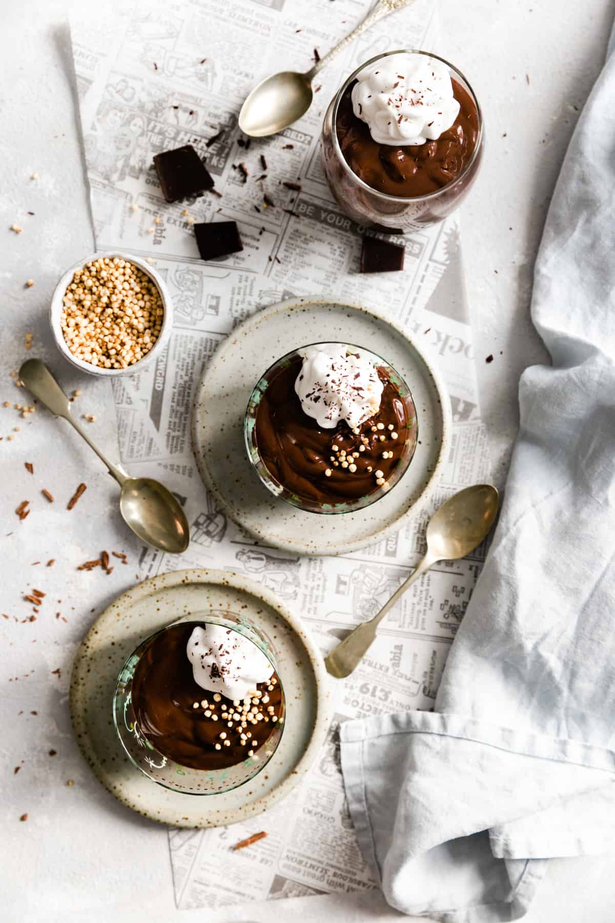 overhead shot of 3 glasses with vegan chocolate pudding