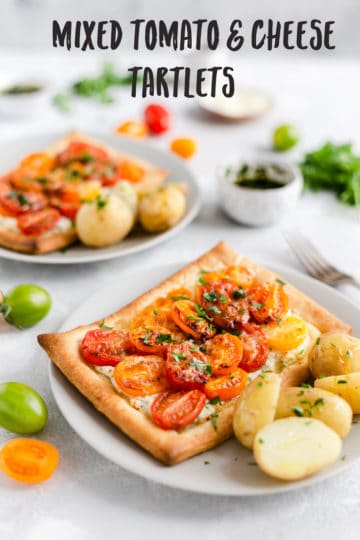 Super easy recipe for mixed tomato and cheese tarlet. Sweet and juicy tomatoes on crispy, buttery pastry! Perfect meal for lunch or dinner, ready in under 30 minutes! #tomatoes #tomatotart #vegetarianrecipe | via @annabanana.co