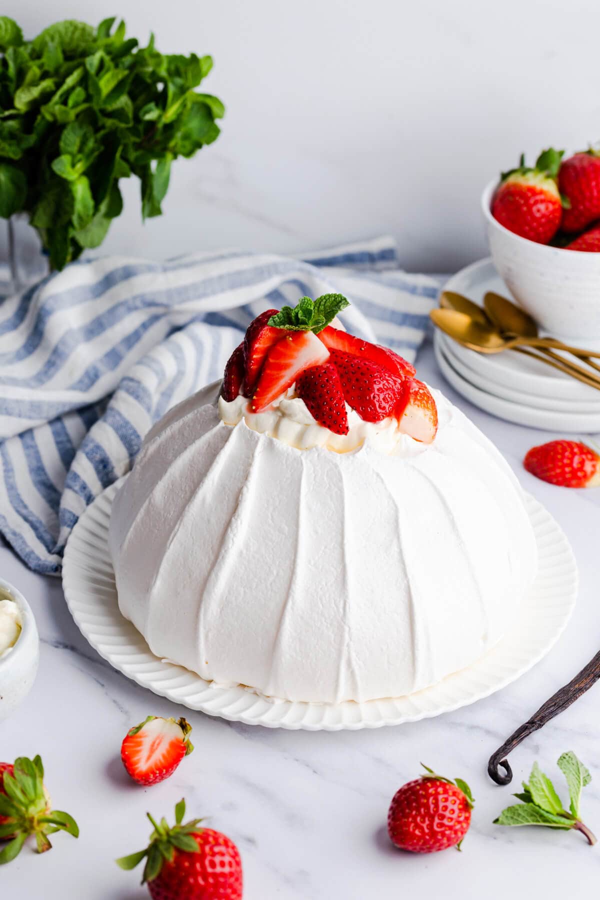 side view of the pavlova meringue on a white plate