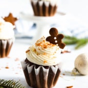 side close up of gingerbread cupcake with cream cheese frosting