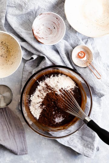 overhead shot of a bowl with flour and cocoa powder
