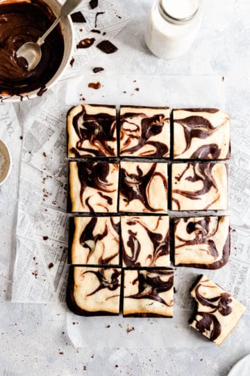 overhead shot of cheesecake brownies cut into squares