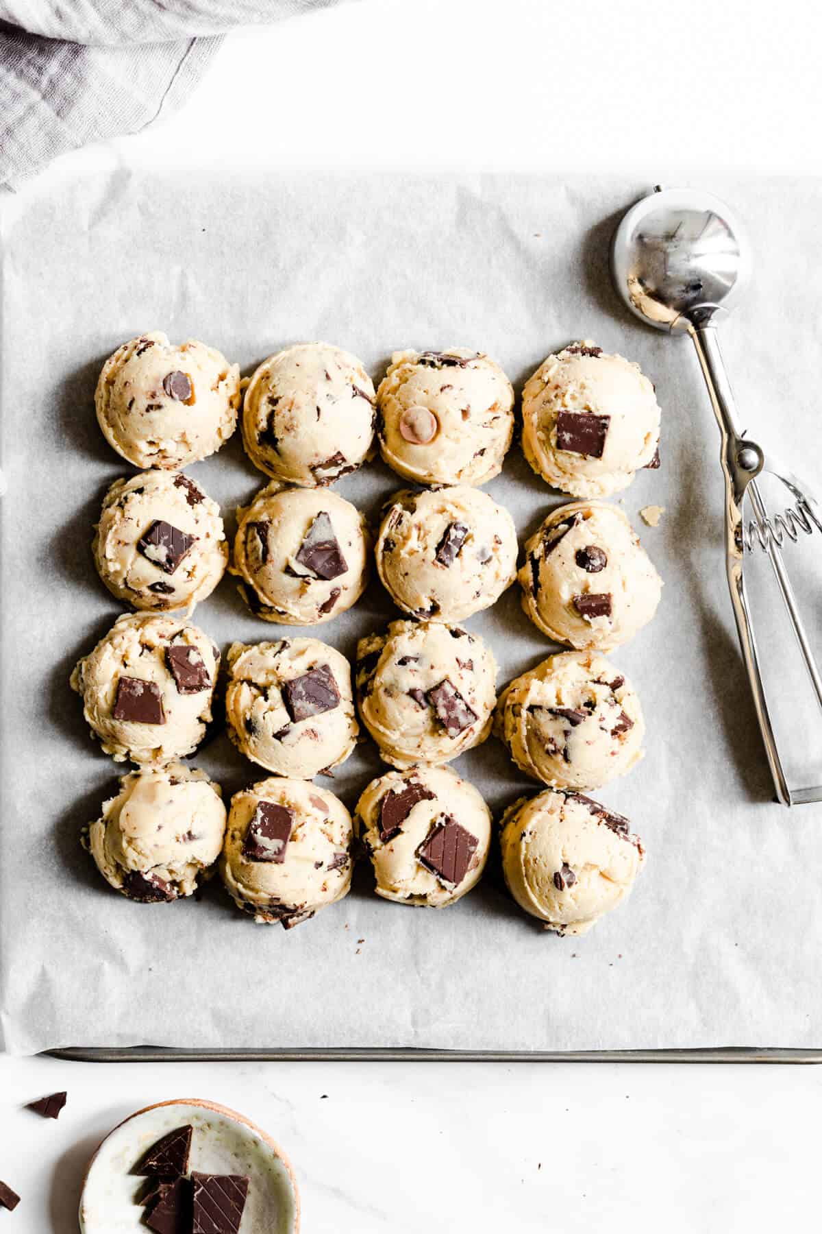 top view of balls of cookie dough on baking tray