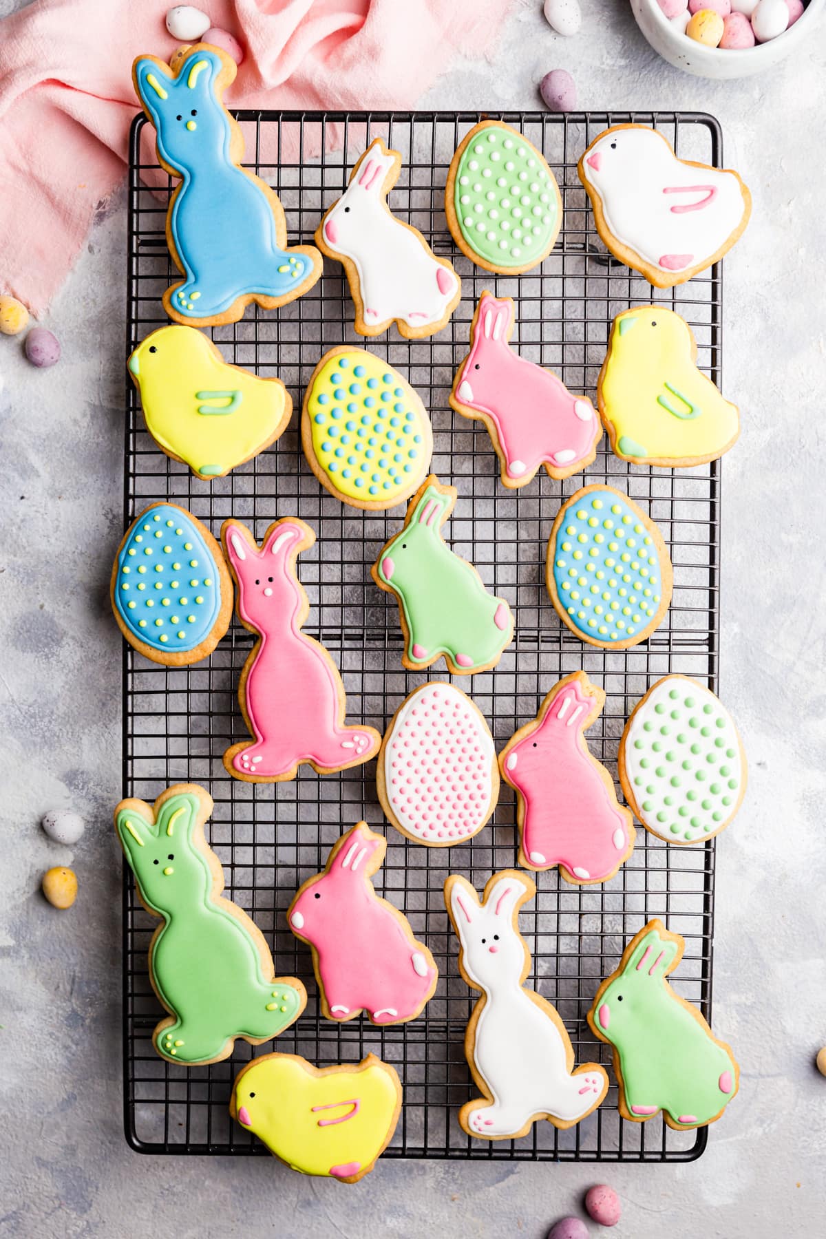 top view of Easter sugar cookies with royal icing on a wire rack