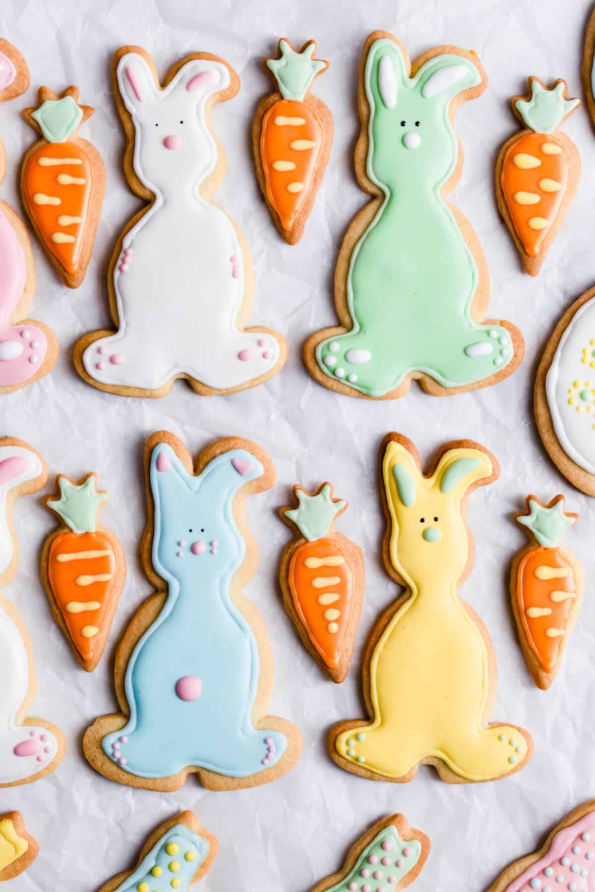 top view of bunny-shaped sugar cookies with icing