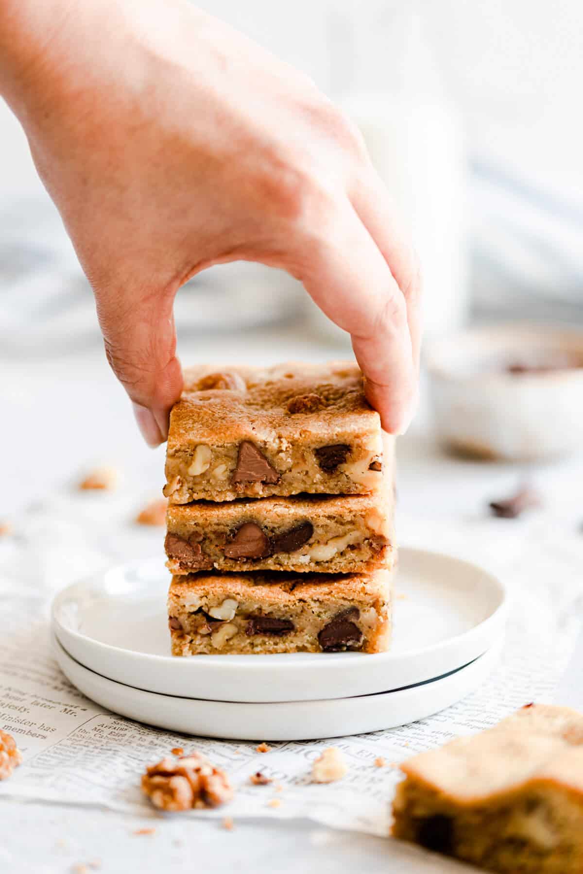 side close up of a hand reaching for a blondie bar