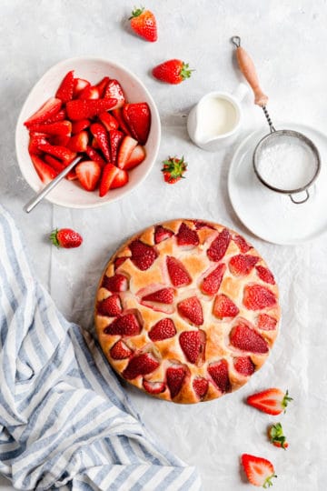 overhead shot of cake with fresh strawberries