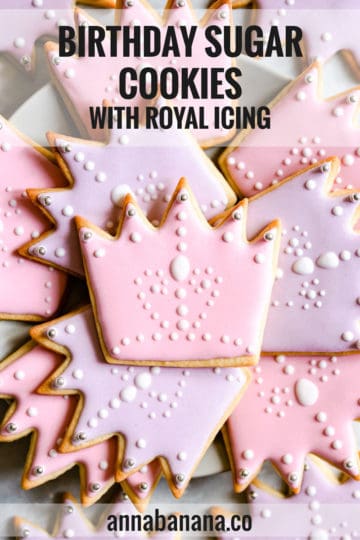 super close up at crown-shaped sugar cookies with royal icing and text overlay