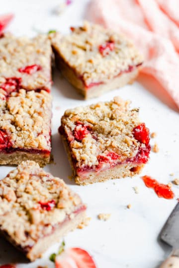 side close up of a square slice of strawberry crumble