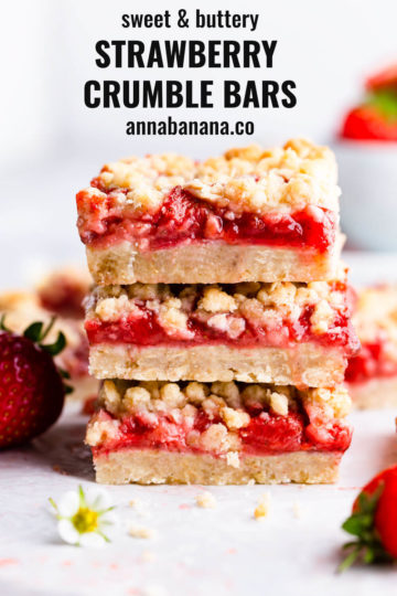 straight ahead angle super close up of 3 strawberry crumble bars stacked on top of one another with text overlay