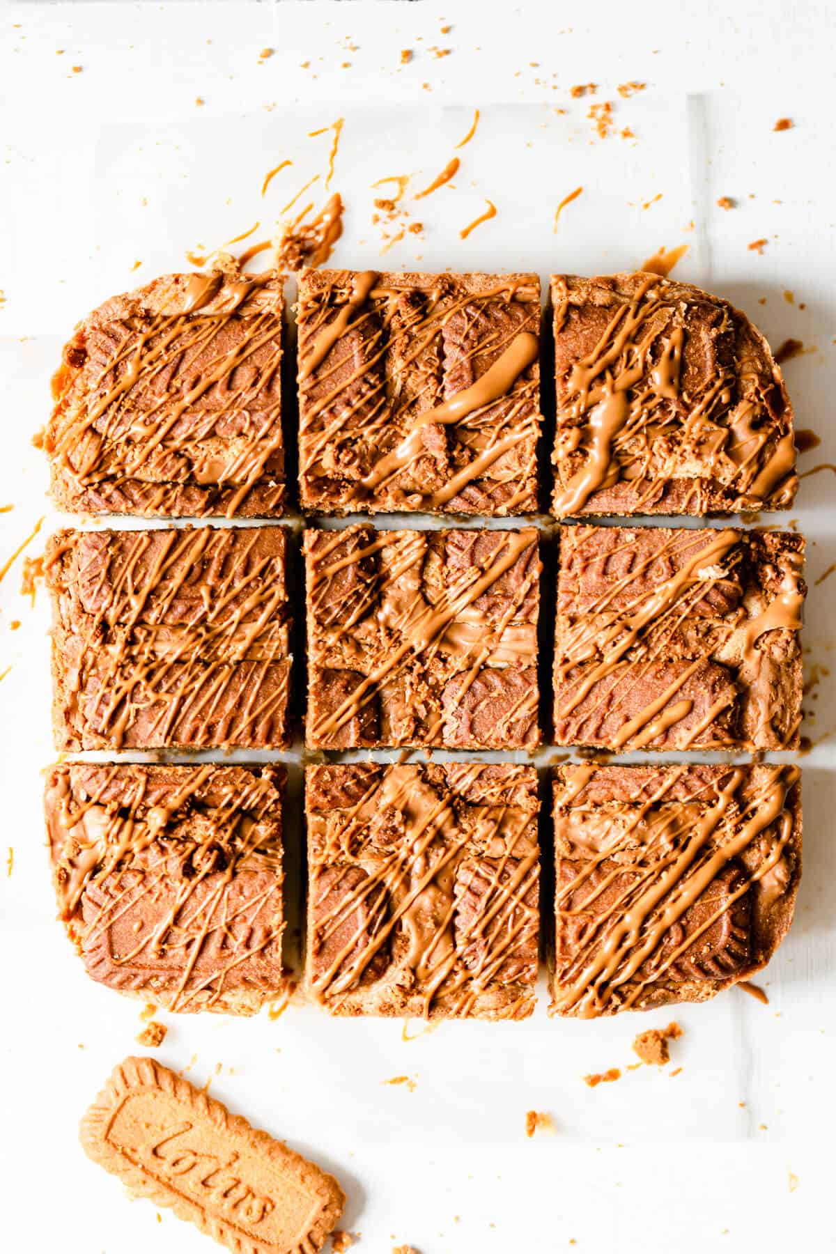 overhead shot of speculoos blondies cut into 9 equal square slices