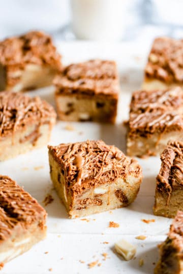 side angle of blondie slices on white surface
