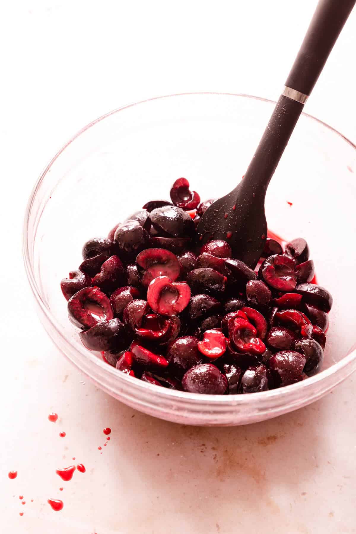 side close up of cherry filling in a glass bowl