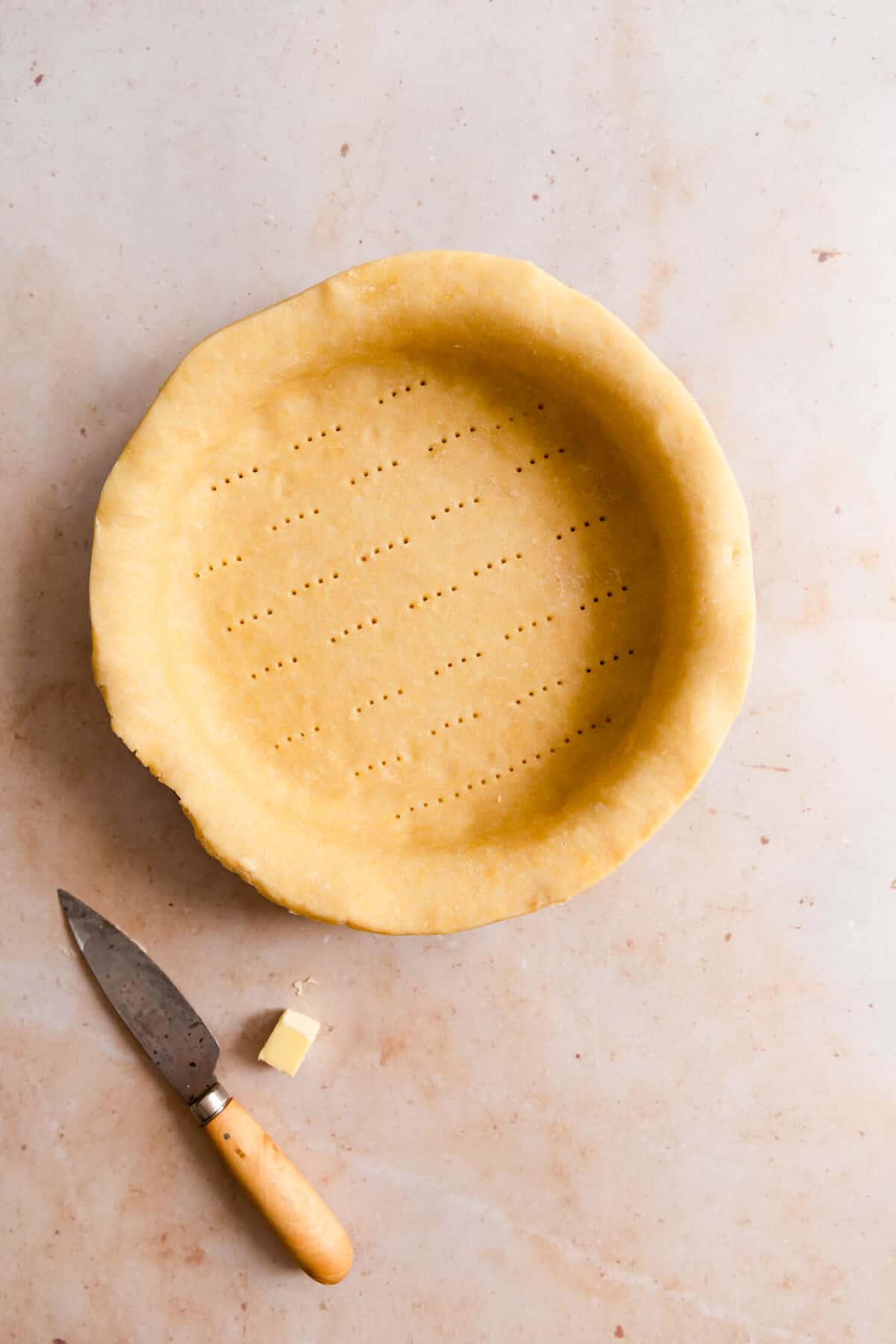 top view of unbaked pie pastry in a baking dish