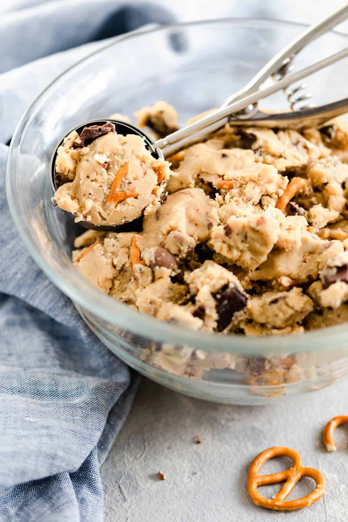 side close up of a glass bowl with cookie dough