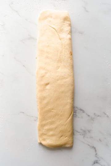 top view of soft dough folded into rectangle