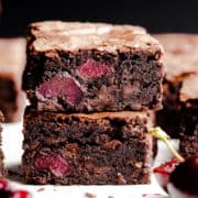 super close up at two slices of chocolate cherry brownies