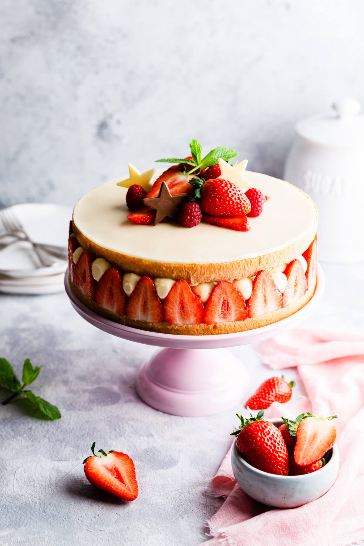 45 degree angle photo of fresh strawberry cake with creme mousseline