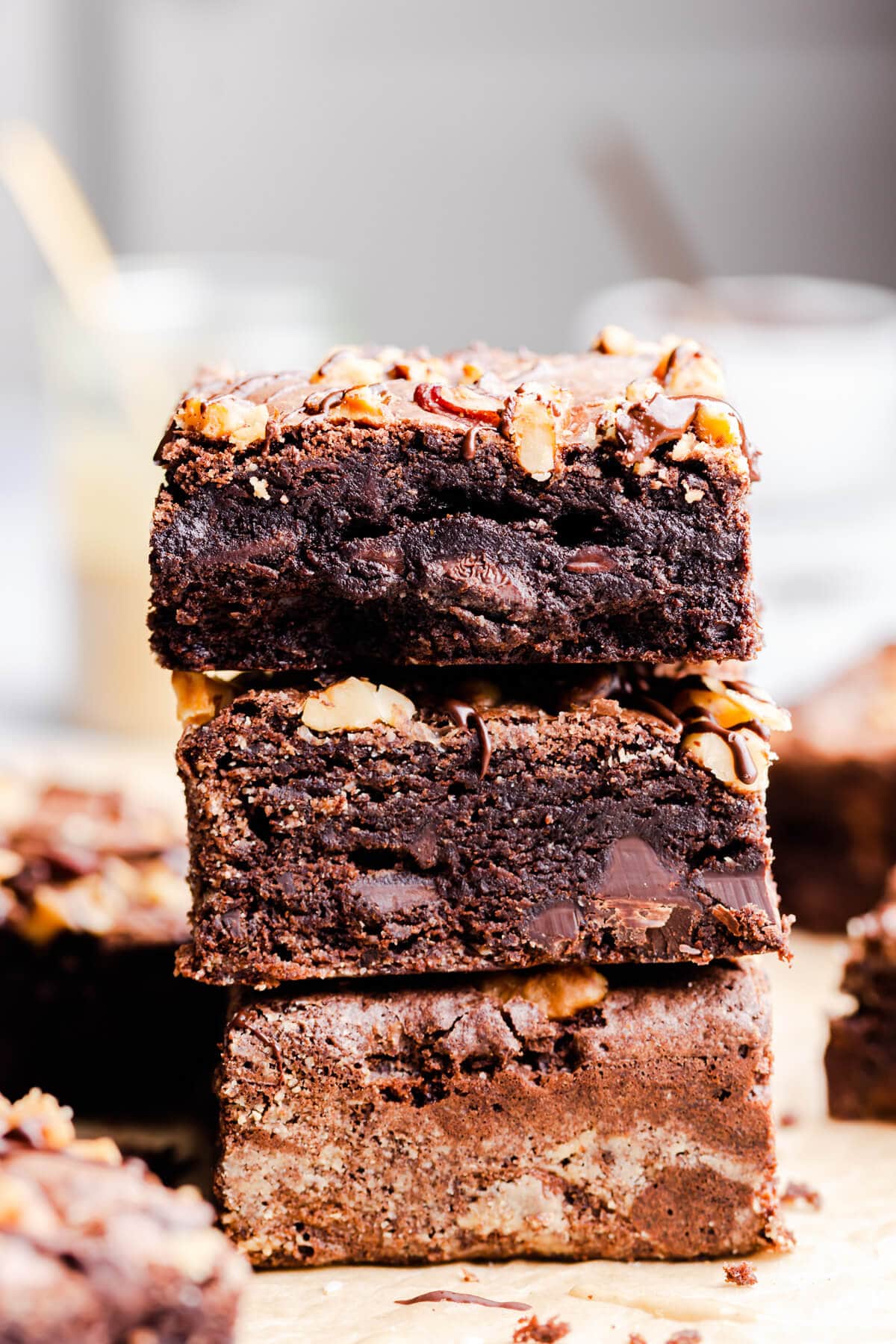 side close up at a stack of three brownies on top of each other