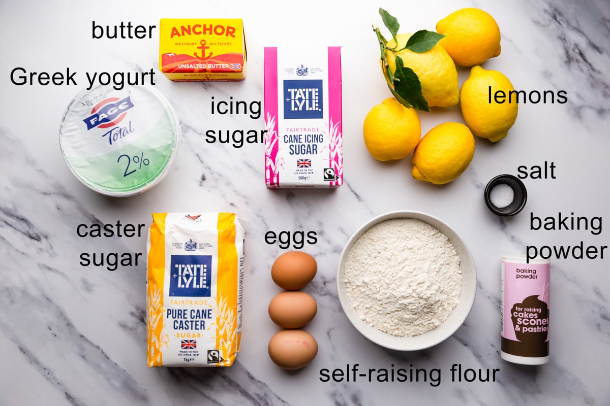 top view of the ingredients to make zesty lemon cake with text labels