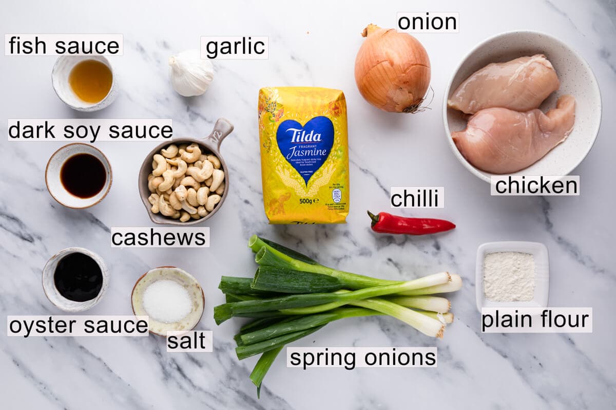 top view of the ingredients for Thai cashew chicken with text labels