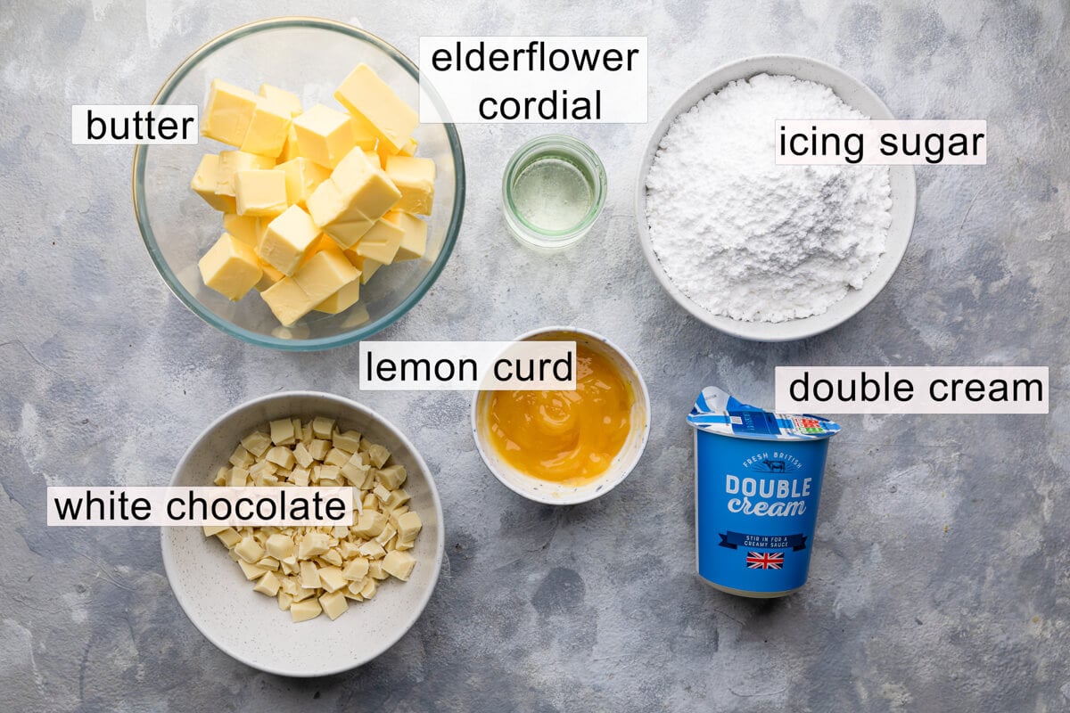 top view of the ingredients for lemon and elderflower cake with text labels