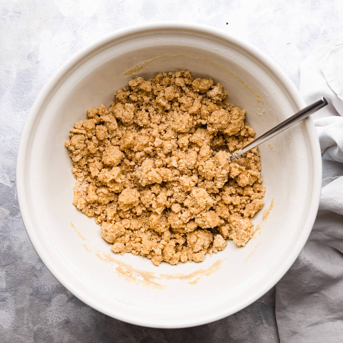 overhead photo of a crumble mixture in a bowl