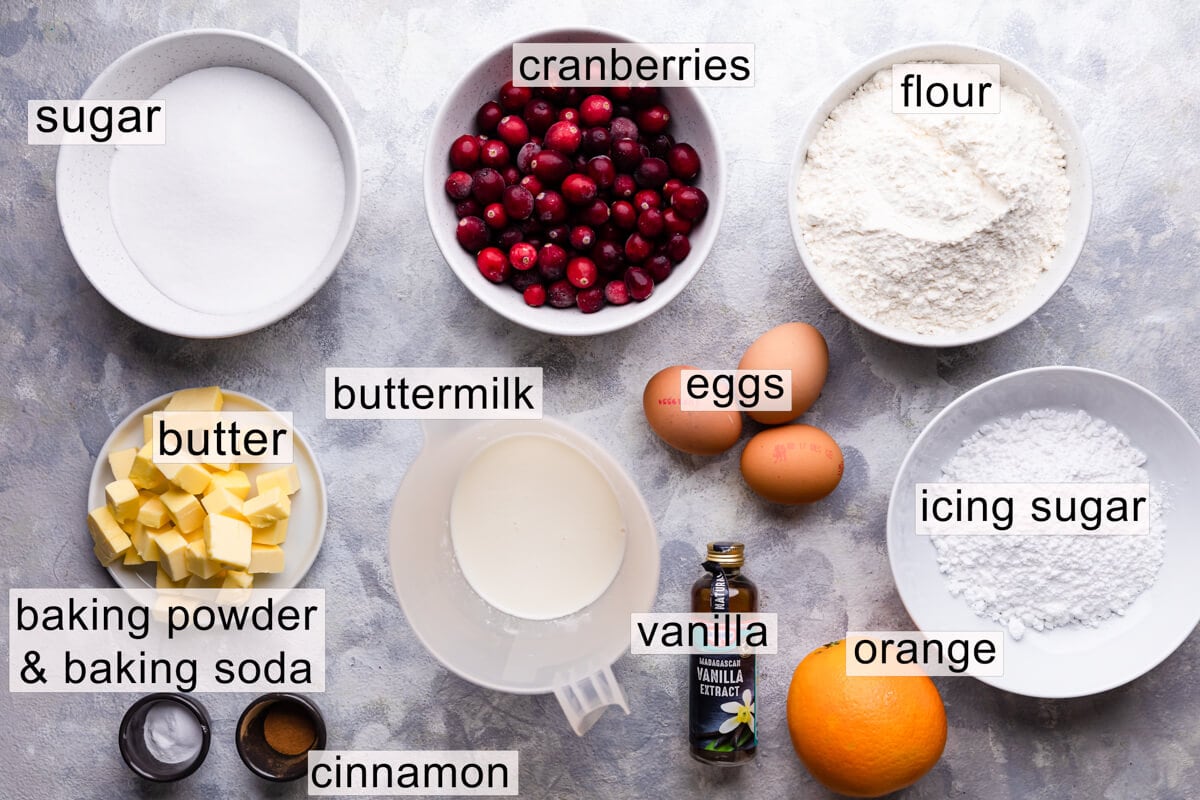 ingredients for orange cranberry bundt cake with text labels.